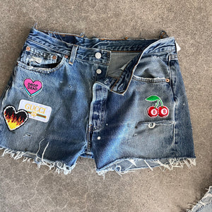 Levis Cutoffs 16” flat lay