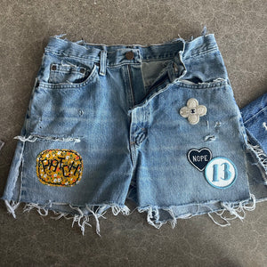 Wrangler Cutoffs 14” flat lay