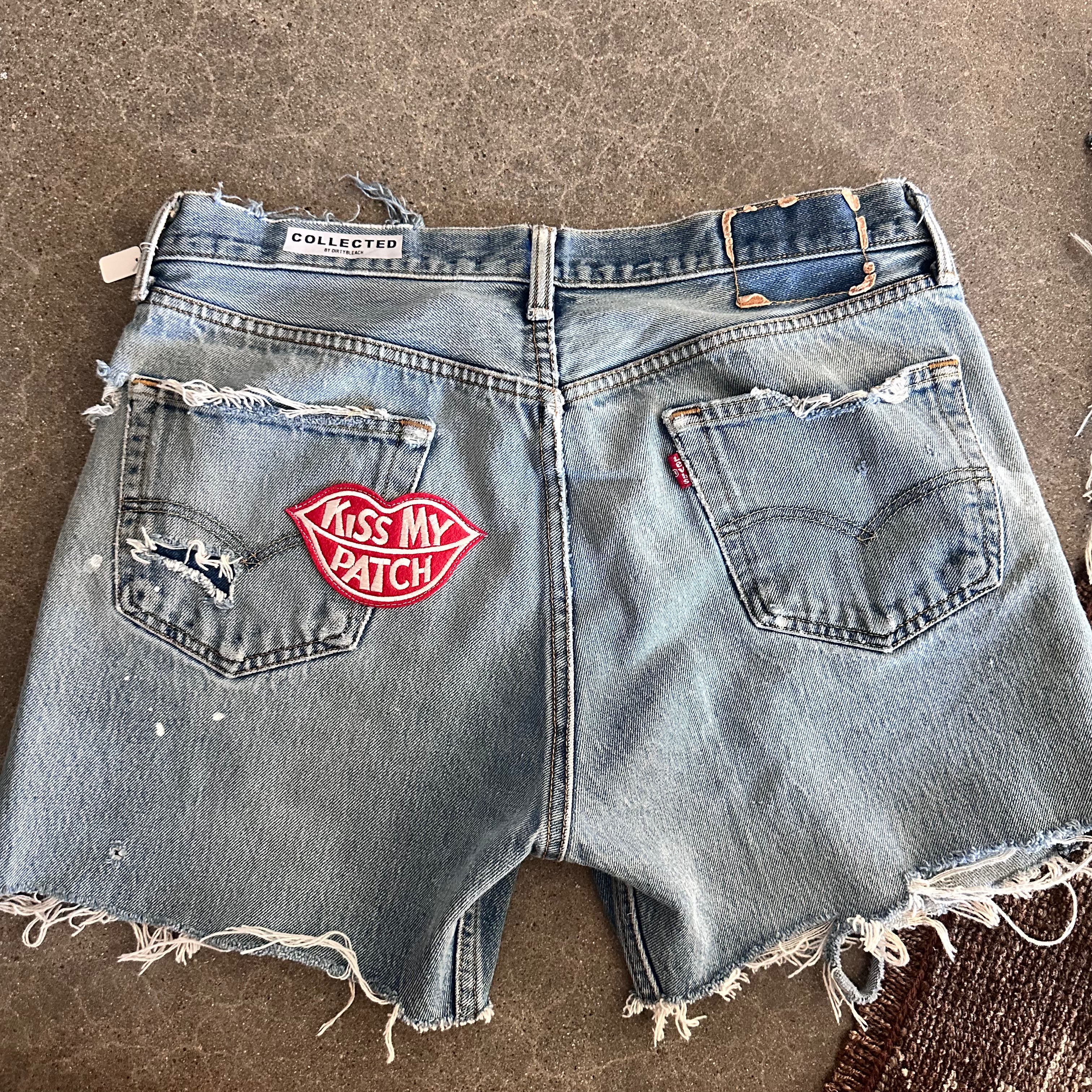 Levis Cutoffs 17” flat lay